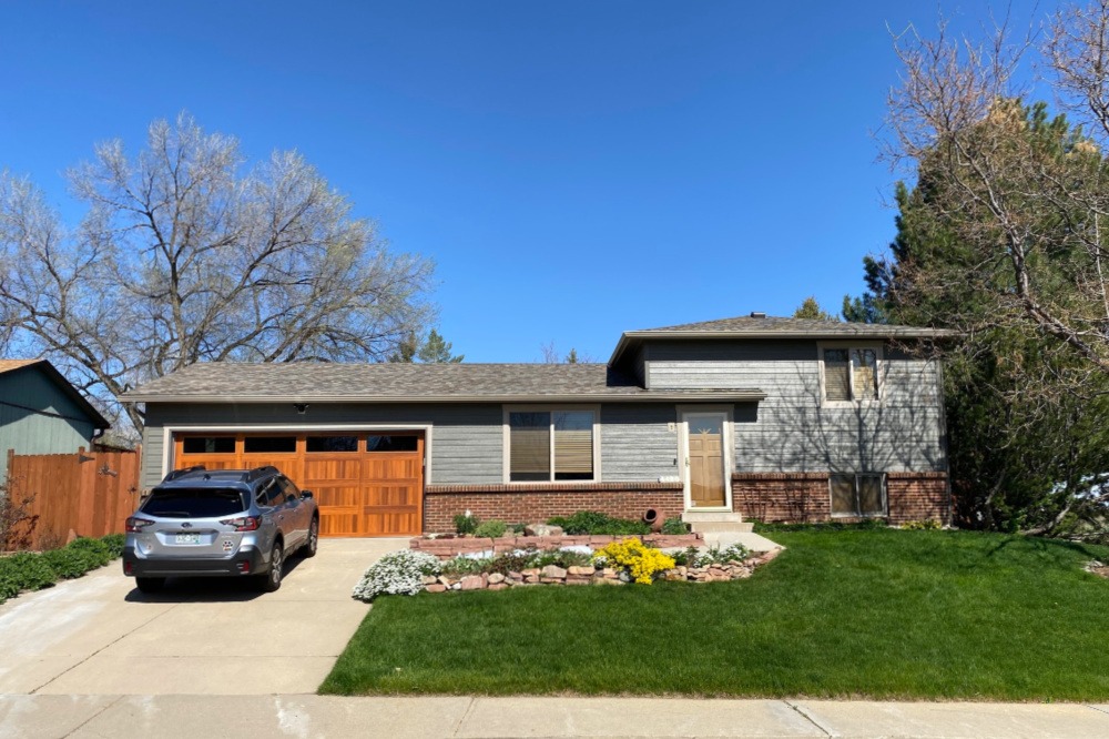 Denver area remodel with new roof, siding, garage door and gutter repair